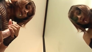 Redhead Ladyboy In darksome underware Sucks A dildo By The Mirror